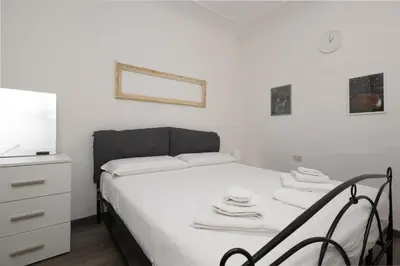 Letto o letti in una camera di Santo Spirito Urban Apartment