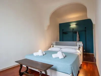 Letto o letti in una camera di Apartment Piazza del Carmine Apartament by Interhome