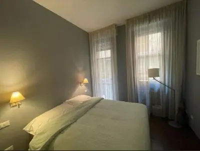 Letto o letti in una camera di Old Bridge Florence Apartment