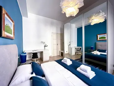 Letto o letti in una camera di Signoria Apartment