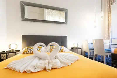 Letto o letti in una camera di Signoria Apartment