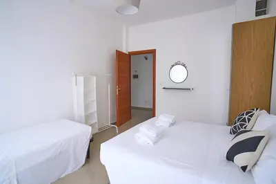 Letto o letti in una camera di SMN-Duomo Two-Room Apartment