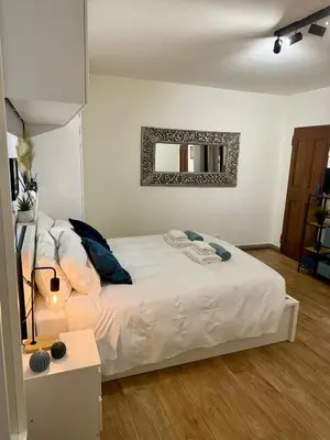 Letto o letti in una camera di Guelfa63 - Deliziosa Suite nel cuore di Firenze