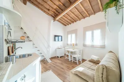 Area soggiorno di Nido romantico e accogliente nel cuore di Firenze
