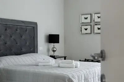Letto o letti in una camera di Black & Wild - Eleganza e relax vicino Firenze