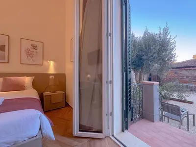 Letto o letti in una camera di InCorte Florence - Guesthouse