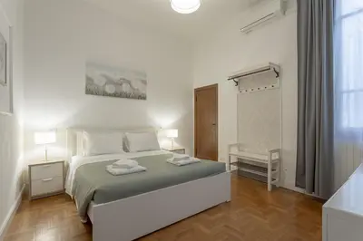 Letto o letti in una camera di Delux Via Faenza