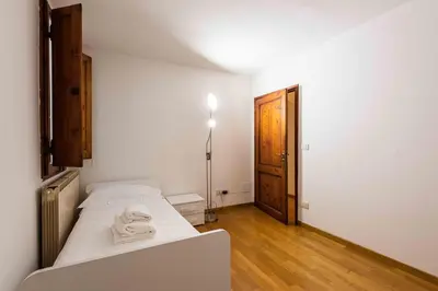Letto o letti in una camera di Old City Nest by MMega