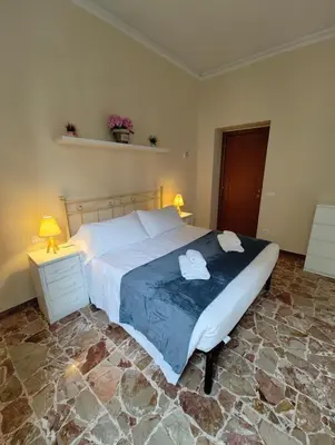 Letto o letti in una camera di Suite Eleonora