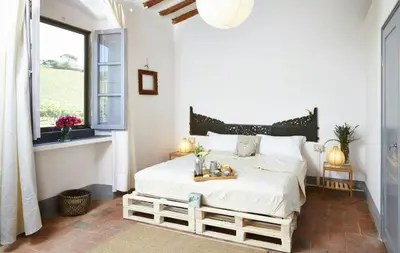 Letto o letti in una camera di Rustic Villa With Pool In The Heart Of Chianti