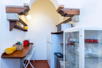 Cucina o angolo cottura di Charming Historic Apartment with Modern Comfort in the Heart of Florence