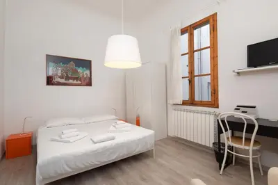 Letto o letti in una camera di Ognissanti Central Apartment