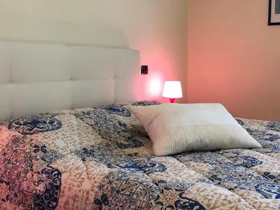 Letto o letti in una camera di 3 Perle all'Accademia Apartments