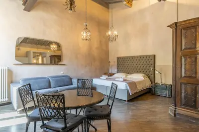 Letto o letti in una camera di Firenze Rentals Accademia