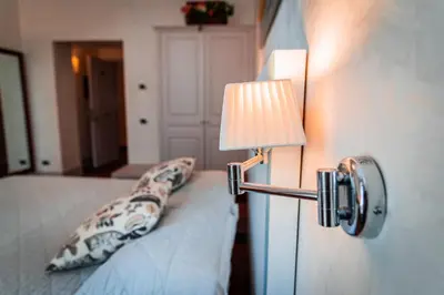 Letto o letti in una camera di Il Salotto Di Firenze