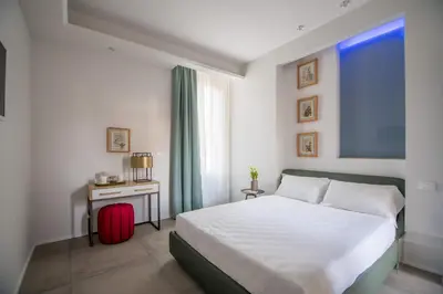 Letto o letti in una camera di Relais Luce Florence