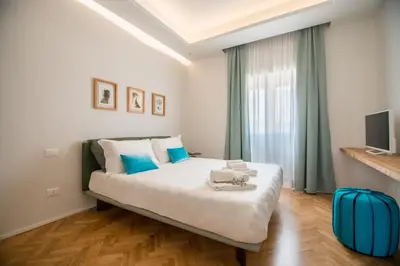 Letto o letti in una camera di Relais Luce Florence