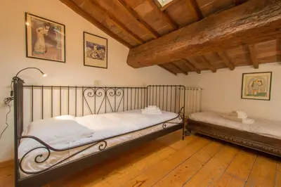 Letto o letti in una camera di Appartamento Bellavista Firenze