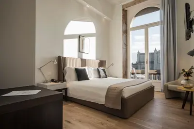 Letto o letti in una camera di 7Florence