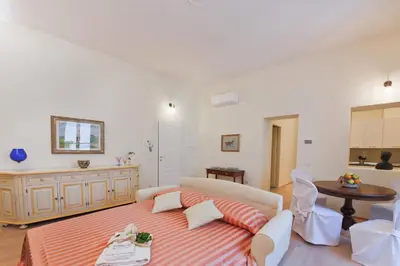 Letto o letti in una camera di Proconsolo Superior Suite