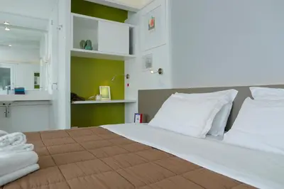 Letto o letti in una camera di hu Firenze Camping in Town