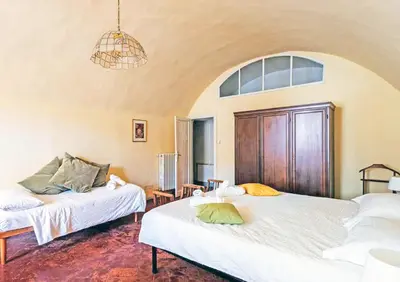 Letto o letti in una camera di Fiamma Apartment