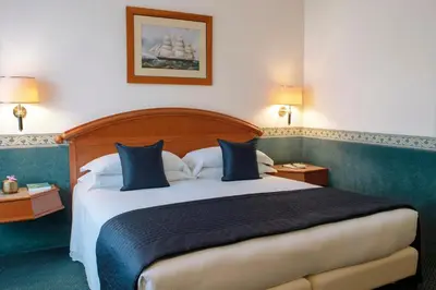 Letto o letti in una camera di Starhotels Vespucci