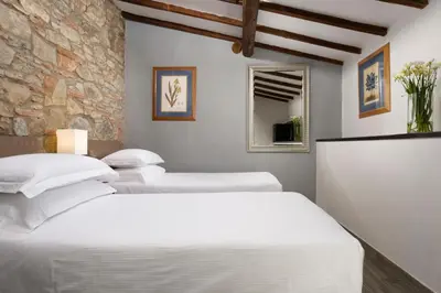Letto o letti in una camera di FH55 Med Guesthouse