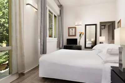 Letto o letti in una camera di FH55 Med Guesthouse