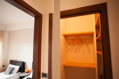 Letto o letti in una camera di Appartamento Alberto