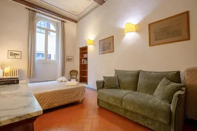 Letto o letti in una camera di Rondinelli Charme Prestige