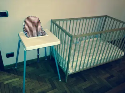 Letto o letti in una camera di La tua Casa a Firenze con parcheggio privato per 2 auto