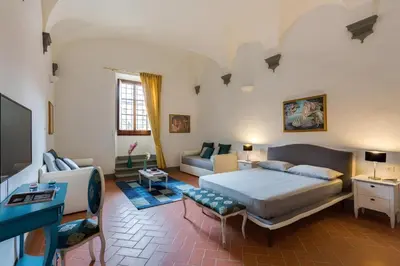 Letto o letti in una camera di Residenza d'Epoca Galleria dell'Accademia