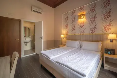 Letto o letti in una camera di B&B Repubblica