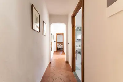 Letto o letti in una camera di Piccolo Iris Firenze