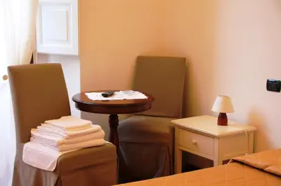Letto o letti in una camera di B&B Magnifico Messere
