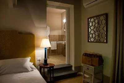 Letto o letti in una camera di Nove Guest House