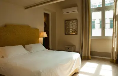 Letto o letti in una camera di Nove Guest House
