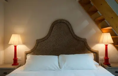 Letto o letti in una camera di Nove Guest House