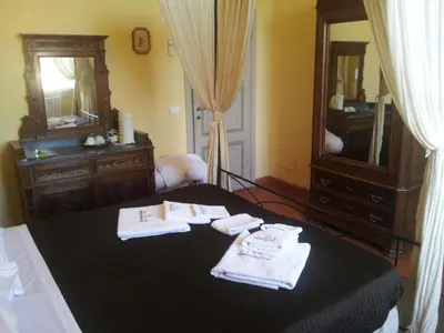 Letto o letti in una camera di Sangaggio House B&B