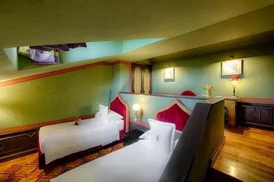 Letto o letti in una camera di Villa Cora