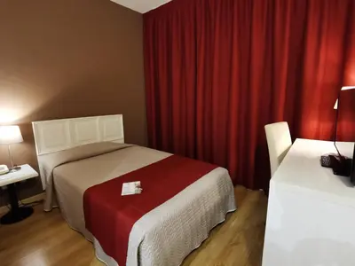 Letto o letti in una camera di Hotel President