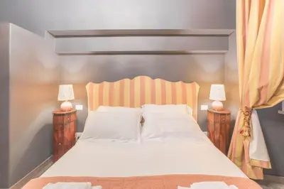 Letto o letti in una camera di Appartamento Cellini