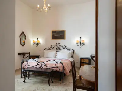 Letto o letti in una camera di Giglio & Viola Borgia