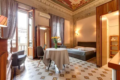 Letto o letti in una camera di Sleep Tight Florence Apartment