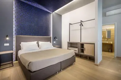 Letto o letti in una camera di Blu Notte Guest House