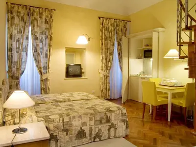 Letto o letti in una camera di Piccolo Residence Apart-Hotel
