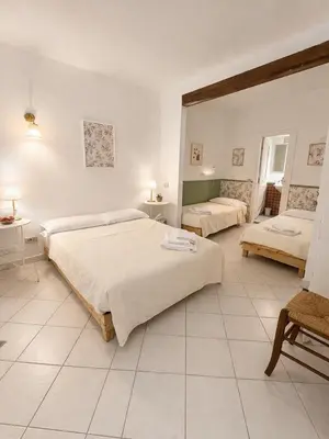 Letto o letti in una camera di Close to Michelangelo