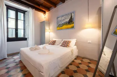 Letto o letti in una camera di Keys of Italy - F1 - Fiesolana 24 - Santa Croce one bedroom apartment for couples