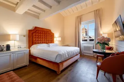 Letto o letti in una camera di San Firenze Suites & Spa